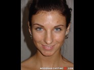 Marketa is sited on a sofa, legs appart and looking at you