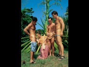 Eva roberts is sited on a sofa, legs appart and looking at you