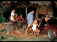 Asian shan and Monica sweet are sited on a sofa, legs appart and looking at you