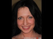 Raffaella is sited on a sofa, legs appart and looking at you