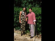 Myrka is sited on a sofa, legs appart and looking at you