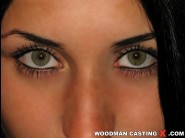 Roxy taggart is sited on a sofa, legs appart and looking at you