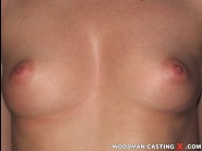 Felicia is sited on a sofa, legs appart and looking at you