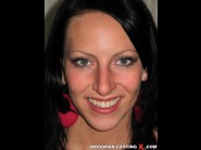 Leonelle knoxville is sited on a sofa, legs appart and looking at you