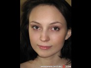 Nataly von is sited on a sofa, legs appart and looking at you