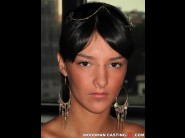 Nancy fancy is sited on a sofa, legs appart and looking at you