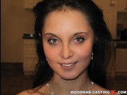  is sited on a sofa, legs appart and looking at you