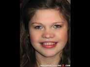 Samanta cute is sited on a sofa, legs appart and looking at you