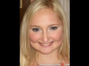 Paris diamond is sited on a sofa, legs appart and looking at you