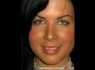 Rihanna samuel is sited on a sofa, legs appart and looking at you