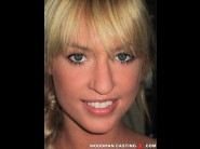 Victoria white is sited on a sofa, legs appart and looking at you