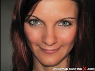 Christine wild is sited on a sofa, legs appart and looking at you