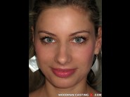 Maryline ms is sited on a sofa, legs appart and looking at you