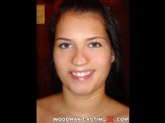 Veronica de souza is sited on a sofa, legs appart and looking at you