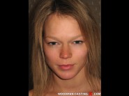 Ielza is sited on a sofa, legs appart and looking at you