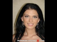 Roxy panther is sited on a sofa, legs appart and looking at you