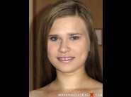 Jenny love is sited on a sofa, legs appart and looking at you