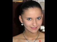 Getty is sited on a sofa, legs appart and looking at you