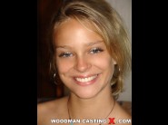 Klara fox is sited on a sofa, legs appart and looking at you