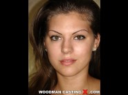 Hannah hunter is sited on a sofa, legs appart and looking at you