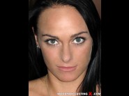 Lilith virago is sited on a sofa, legs appart and looking at you