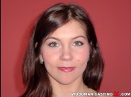 Veronika grandey is sited on a sofa, legs appart and looking at you