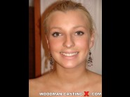 Morgan moon is sited on a sofa, legs appart and looking at you