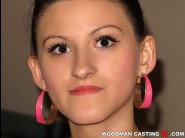 Cutie cloud is sited on a sofa, legs appart and looking at you