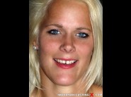 Debby pleasure is sited on a sofa, legs appart and looking at you