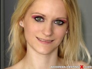 Rossella visconti is sited on a sofa, legs appart and looking at you