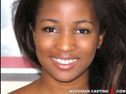 Ivy sherwood is sited on a sofa, legs appart and looking at you