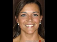 Glubayana is sited on a sofa, legs appart and looking at you