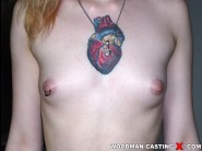 Dull23 is sited on a sofa, legs appart and looking at you