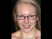 Bijou baby is sited on a sofa, legs appart and looking at you