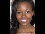 Jezabel vessir is sited on a sofa, legs appart and looking at you