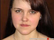 Estelle siam is sited on a sofa, legs appart and looking at you