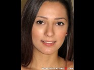 Jaye summers is sited on a sofa, legs appart and looking at you