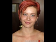 Lucia range is sited on a sofa, legs appart and looking at you