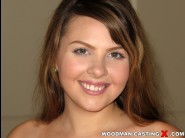 Cali hayes is sited on a sofa, legs appart and looking at you