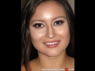 Bliss dulce is sited on a sofa, legs appart and looking at you