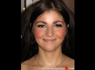 Vera is sited on a sofa, legs appart and looking at you