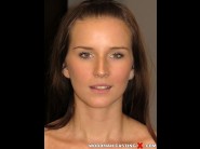 Linda luv is sited on a sofa, legs appart and looking at you