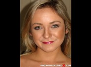 Cleo vixen is sited on a sofa, legs appart and looking at you