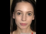 Aria haze is sited on a sofa, legs appart and looking at you