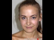 Swabery baby is sited on a sofa, legs appart and looking at you