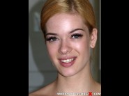 Lilien ford is sited on a sofa, legs appart and looking at you