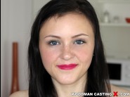 Kiara gold is sited on a sofa, legs appart and looking at you