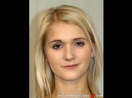 Ashley love is sited on a sofa, legs appart and looking at you