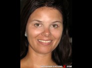 Glenda larker is sited on a sofa, legs appart and looking at you